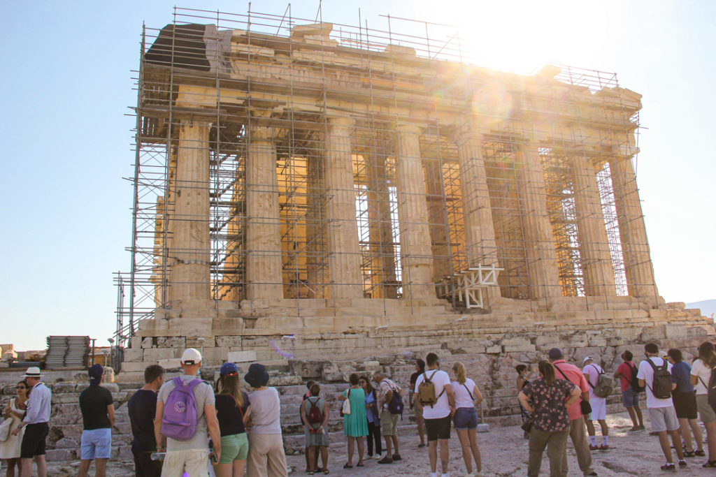 Is Athens worth visiting in 2022? Athens, Greece Parthenon at the Acropolis with tourists