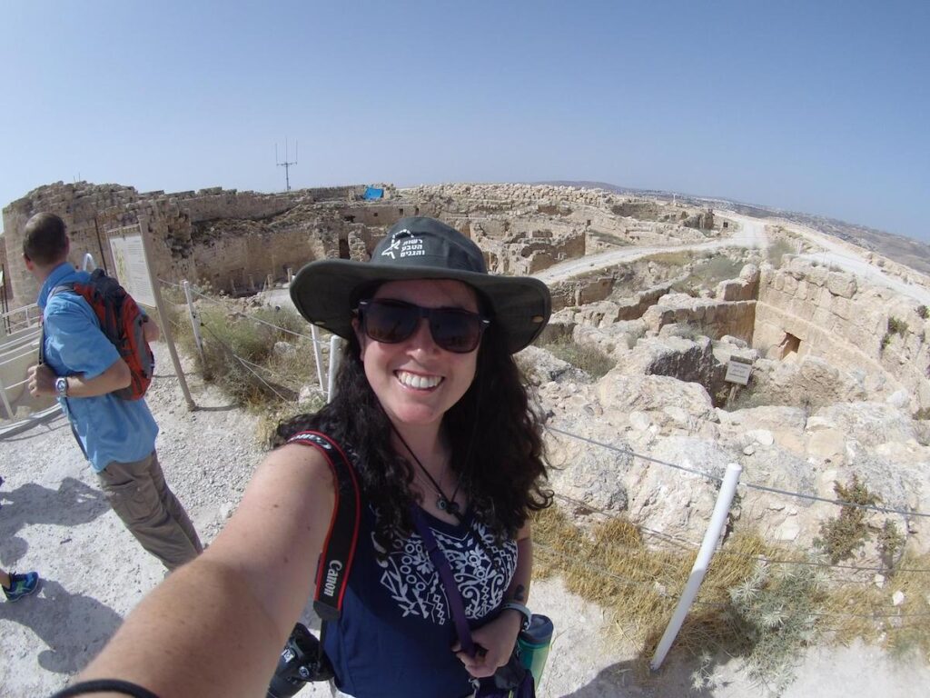 Sarah at Herodium (Herodion), the fortress built by Herod, with archaeological remains behind me