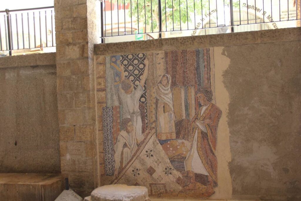 The ancient cardo in Jerusalem's Old City, with a colorful mosaic