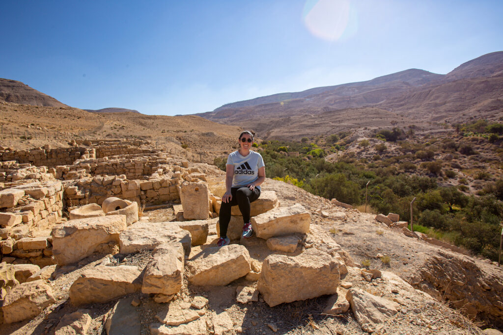The view from Khirbet ed-Dharih in Jordan, with Sarah in the photo